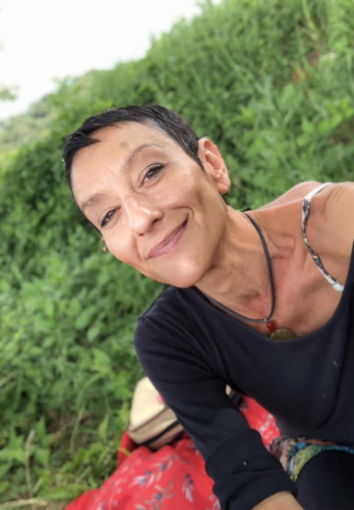 Margarita Georgiadis sitting by the Canal du Midi near Paraza